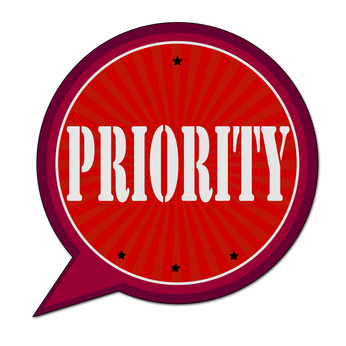 The word "priority" in a red speech bubble